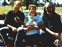 Jaye, Pat & Griz sitting on the Caddy